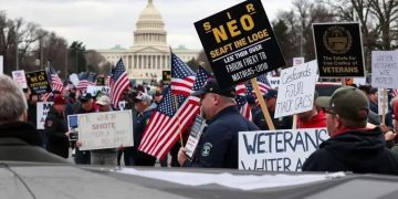 Job cuts for veterans ignite D.C. protest